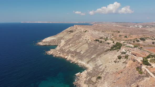 Aerial drone video from western Malta, Mgarr area, Fomm ir-Rih bay. alt
