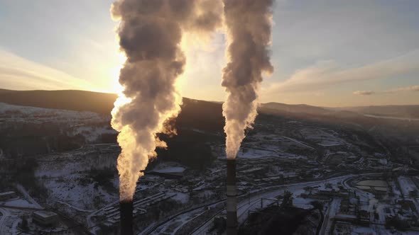 Smoke Rising from the Chimney of a Coal Boiler. alt