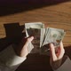 Top View of Caucasian Woman Hands Counting Cash Money Dollar Bills in Slow Motion - VideoHive Item for Sale