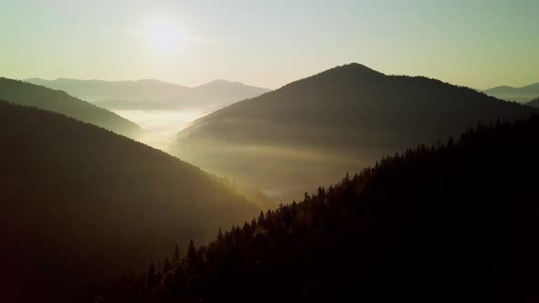 Mountain Peaks and Morning Sky with Smooth Moving Clouds alt