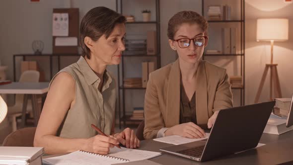 Mature Woman with Teacher Studying Offline alt