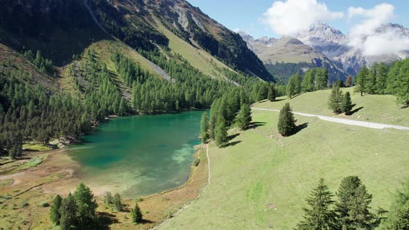 Aerial View Mountain Valley with Alpine Palpuogna Lake in Albulapass Swiss Alps alt