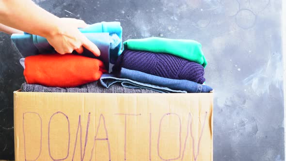 Placing Food Into Donation Box alt