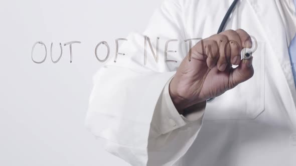 Asian Doctor Writing Out Of Network  alt