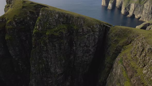 Drone Over Cliffs With Asmundarstakkur Sea Stack alt