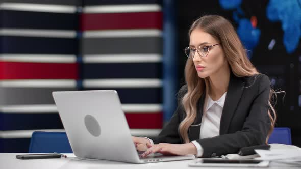 Focused Trendy Blonde Business Woman in Suit White Collar Working on Laptop at Hi Tech Office alt