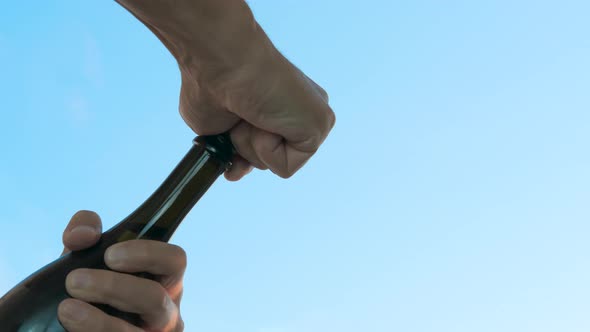 Uncork a bottle.  alt