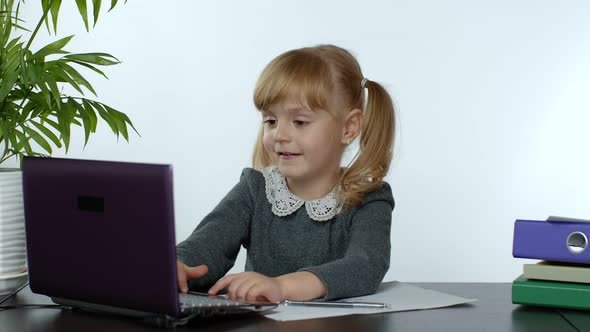 Online Learning, Distance Education, Lesson at Home. Girl Doing School Program Online on Computer alt