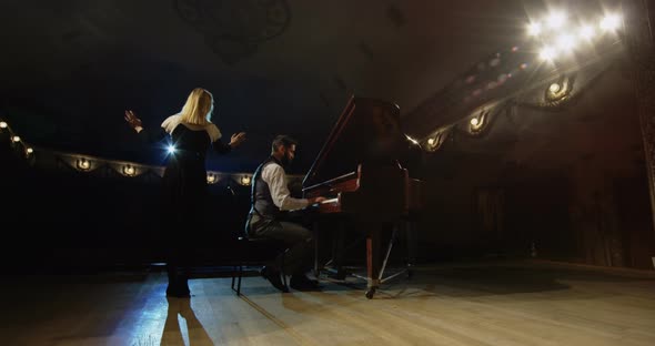 Musician Playing on a Theater Stage alt