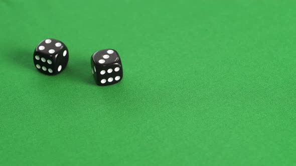 Double Dice Game on Green Casino Table. Player Throwing Double Dice Four and Three on Gaming Table alt