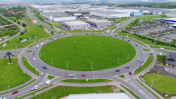 Aerial View of a Roundabout with Industrial Zone 4K