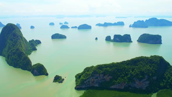 An aerial view from a drone flying over the mouth of the river at Phang Nga Bay alt