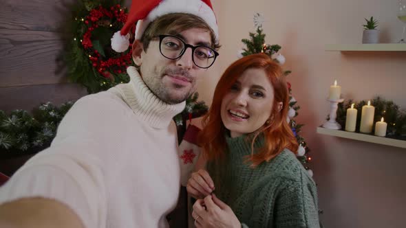 Young Couple having Video Call at Home, speaking with Friends, Family. alt