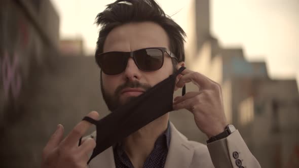 Man Wearing Face Mask On Quarantine Prevention Infection COVID-19 Virus. Health And Safety Concept. alt