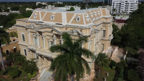 Aerial push in to the Palacio Canton archaeology museum and mansion in Merida, Yucatan, Mexico. alt