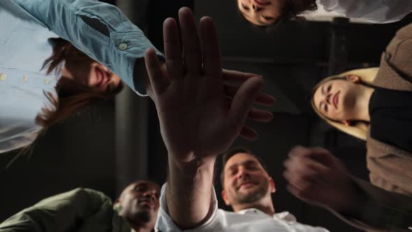 People Stacking Hands Together in Pile Sales Team Engaged in Corporate Teambuilding Connected in alt