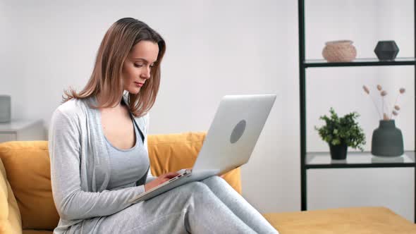 Happy Freelancer Woman Chatting Surfing Internet Working Remotely Use Laptop alt