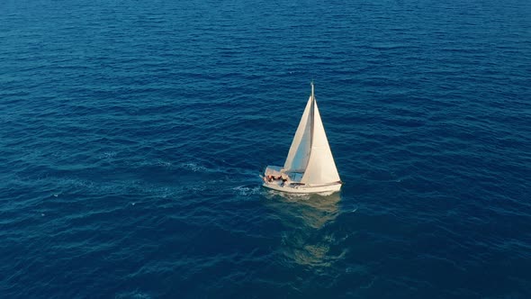 Aerial View. Beautiful View of Yacht Saile in Open Sea alt