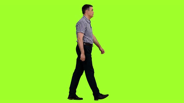 Walking Elegant Man in a Plaid Shirt 