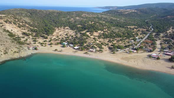 AERIAL. The tropical and scenic nudist beach of Sarakiniko on Gavdos island. alt