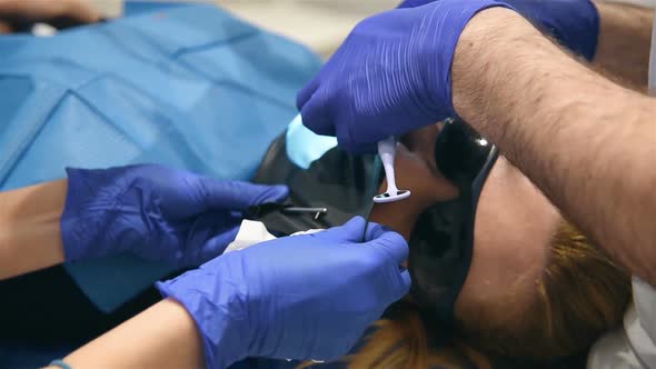 Dentist Puts Cofferdam On Mouth