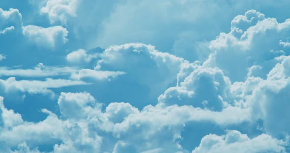 Timelapse of Clouds in the Blue Sky Free Space for the Background alt