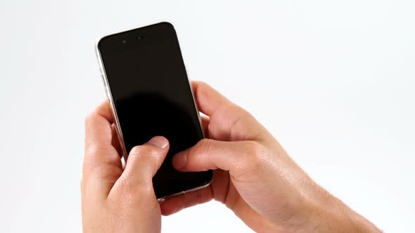 Woman hand using mobile phone alt