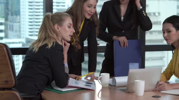 Group Meeting of Professional Businesswomen Thinking with New Project Planning alt