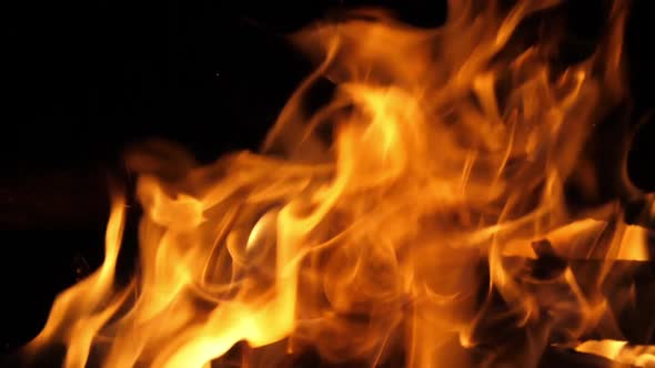 Bonefire, Fire flames in campfire, campsite at Masai Mara Park, Kenya, slow motion alt