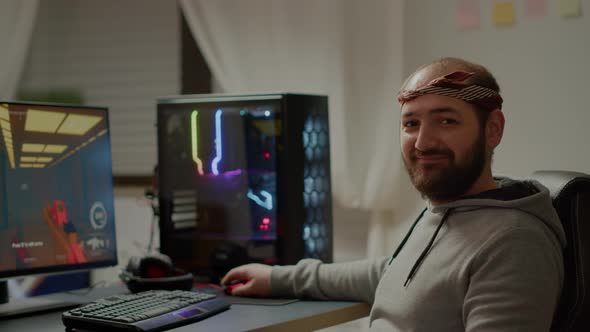 Portrait of Happy Man Looking at Camera Smiling alt