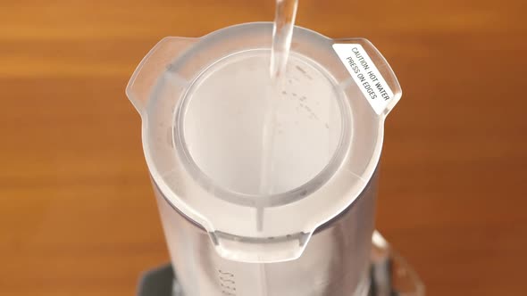 Pouring Water Into Coffee alt