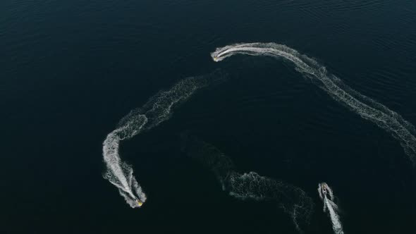 Many Jet Skis Ride in a Circle in One Place. Crazy Fun on the Water. Extreme Jet Skiing. The View alt