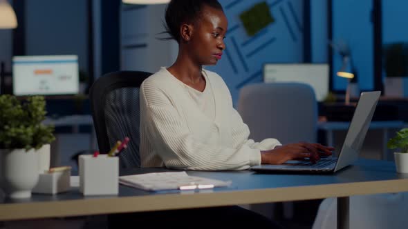 Tired Black Woman Manager Looking at Camera Sighing After alt