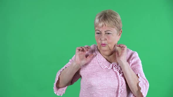 Portrait Elderly Woman Confusedly Looking Around with Fright alt