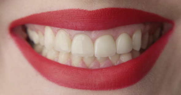 Red Lips Smiling A Macro Shot Of Woman With White Teeth And Pretty Smile alt
