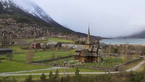 Aerial View On Lom Stave Church In Lom Municipality In Innlandet County, Norway - drone shot alt