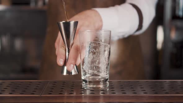 The Bartender Makes a Cocktail alt