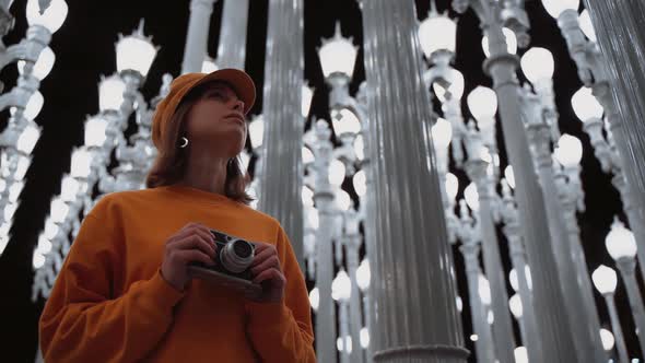 Young girl at the lanterns, slow motion alt