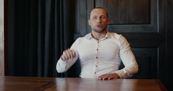 Pensive Adult Entrepreneur Searching for Solution and Then Rejoicing in Success While Working in alt