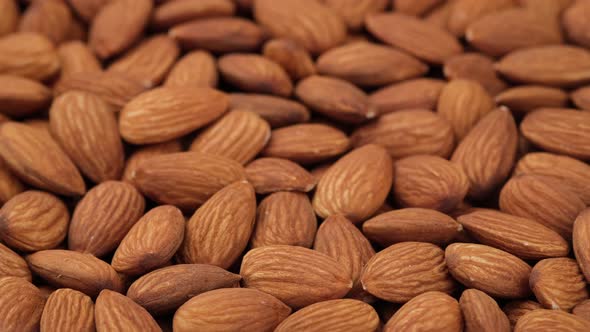 almonds close up rotation. Healthy food alt