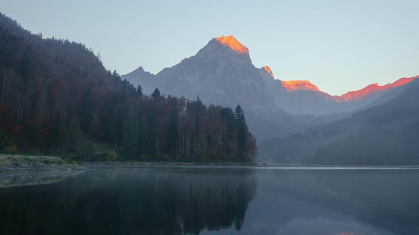 Peaceful Autumn View on Obersee Lake in Swiss Alps