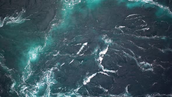 Waves of Water of the River and the Sea Meet Each Other During High Tide and Low Tide alt