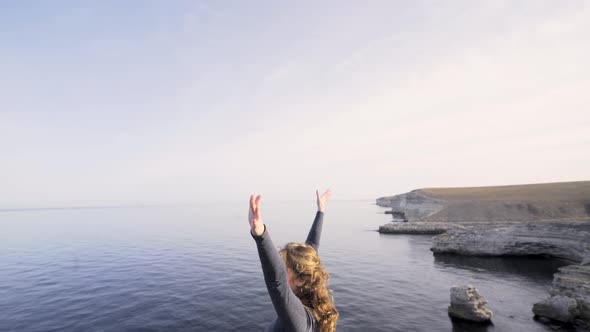 Joyful Woman Grey Track Trains Rocky Coast Ocean