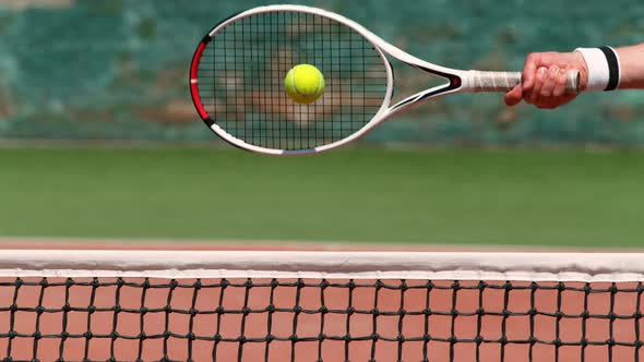 Super Slow Motion Shot of Tennis Hit Over the Net at 1000Fps alt
