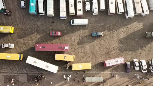 Aerial Footage of Many Cars and Buses Moving on a Busy City Street alt