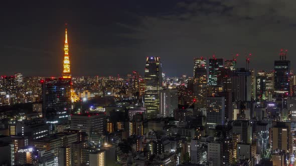 Time Lapse of the densely packed Tokyo Japan skyline shot at night alt