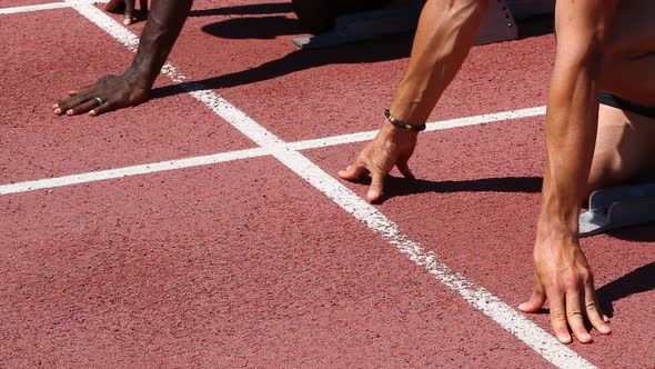 Two Athletes Ready to Start the Race alt