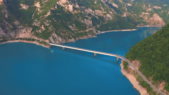 Aerial View on Bridge Over Lake Piva with Mountains of Canyon in Montenegro alt