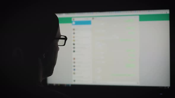 An Adult Man is Texting in a Messenger and Rejoices alt