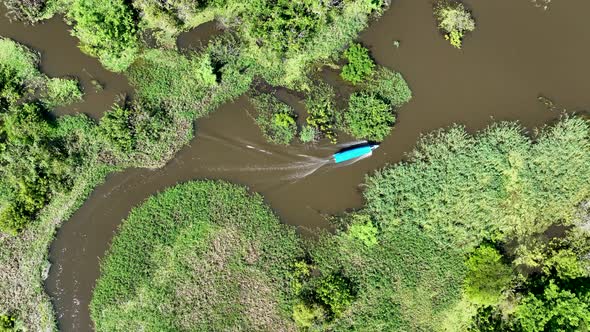 Boat sailing at Amazon River at Amazon Rainforest. Manaus Brazil. alt